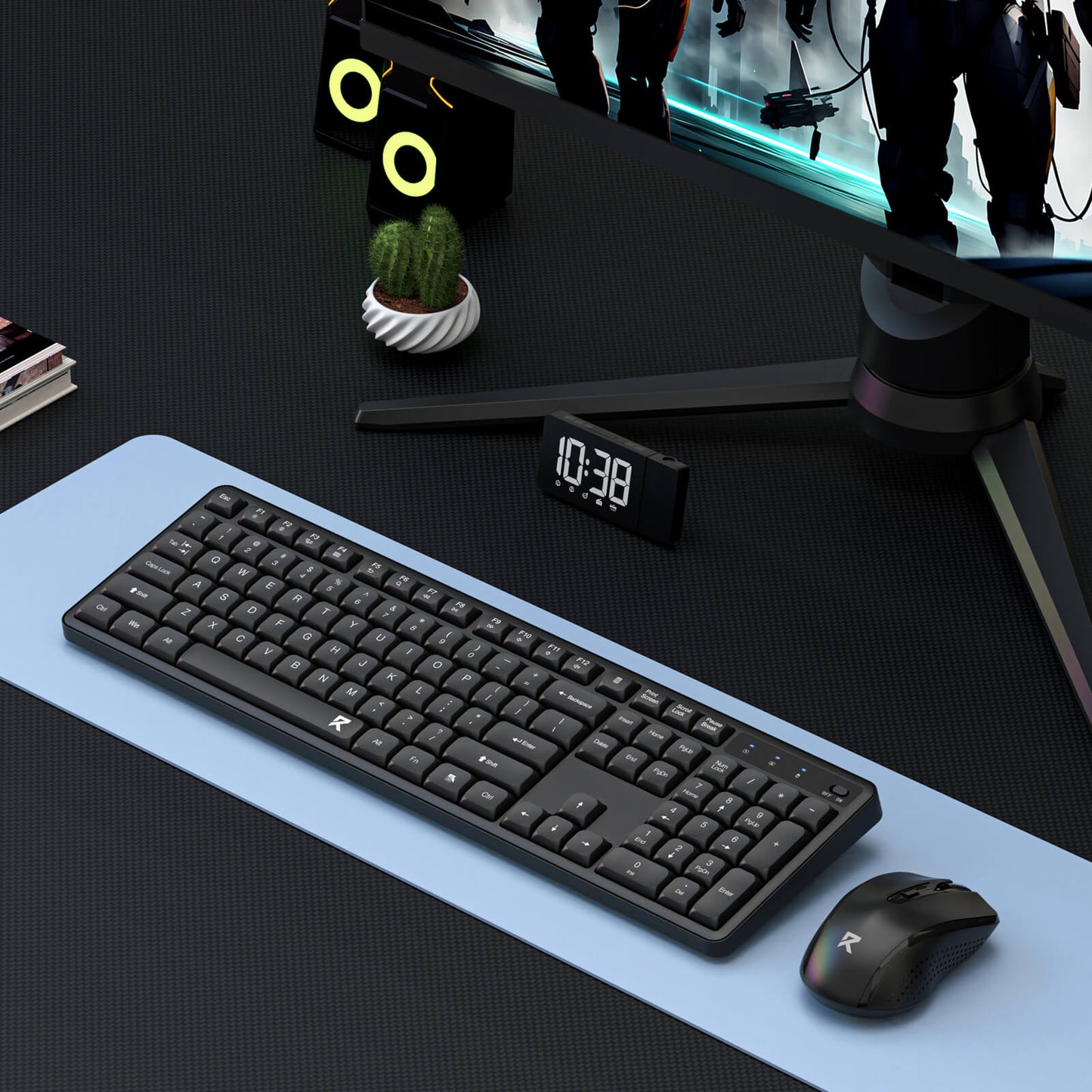 A wireless keyboard and mouse set is displayed in a gaming setup, paired with a monitor, desk clock, and headphones on a light blue desk mat.