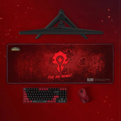 Gaming setup with a mouse pad featuring 'For the Horde!' design on a red background