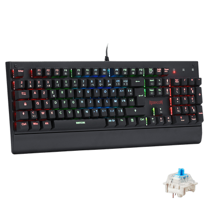 Le clavier mécanique Redragon Manticore est affiché avec son éclairage RGB multicolore, un repose-poignet intégré et un interrupteur bleu détachable pour démontrer son design modulaire.