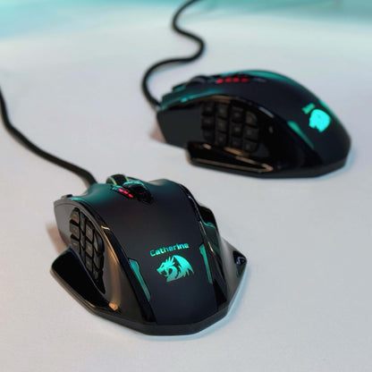 Two gaming mice with illuminated designs on a light background
