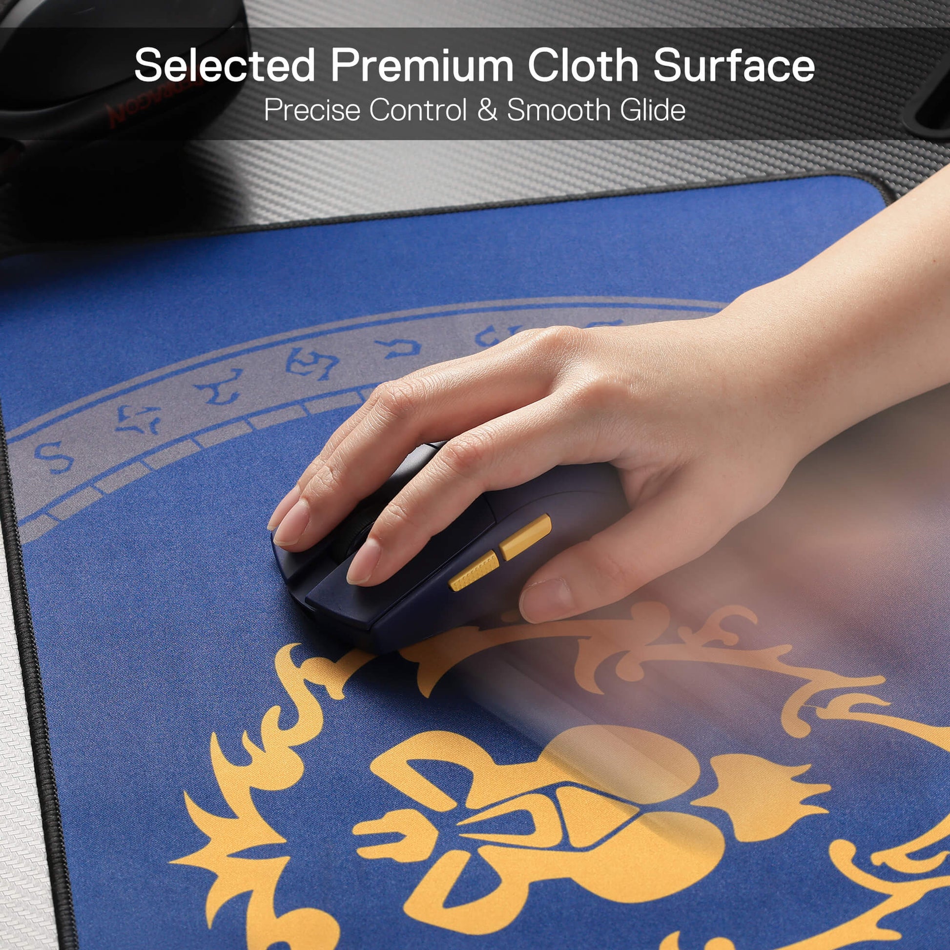 Hand using a mouse on a decorative blue mouse pad with text about premium cloth surface.