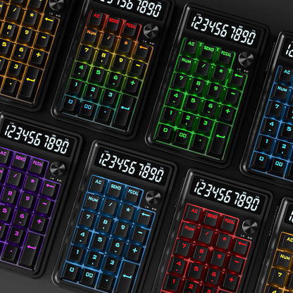 Multiple calculators with colorful backlit keyboards on a dark background