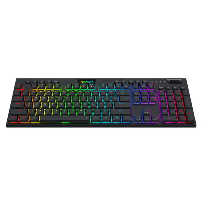 A black mechanical gaming keyboard with vibrant RGB rainbow backlighting, shown from a top-down perspective against a solid black background. The brand name 'Razer' is visible in green on the spacebar area.