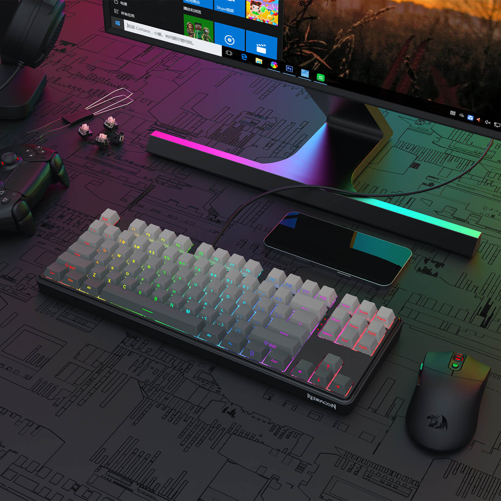 Redragon Gaming setup with keyboard, mouse, and monitor on a detailed desk map