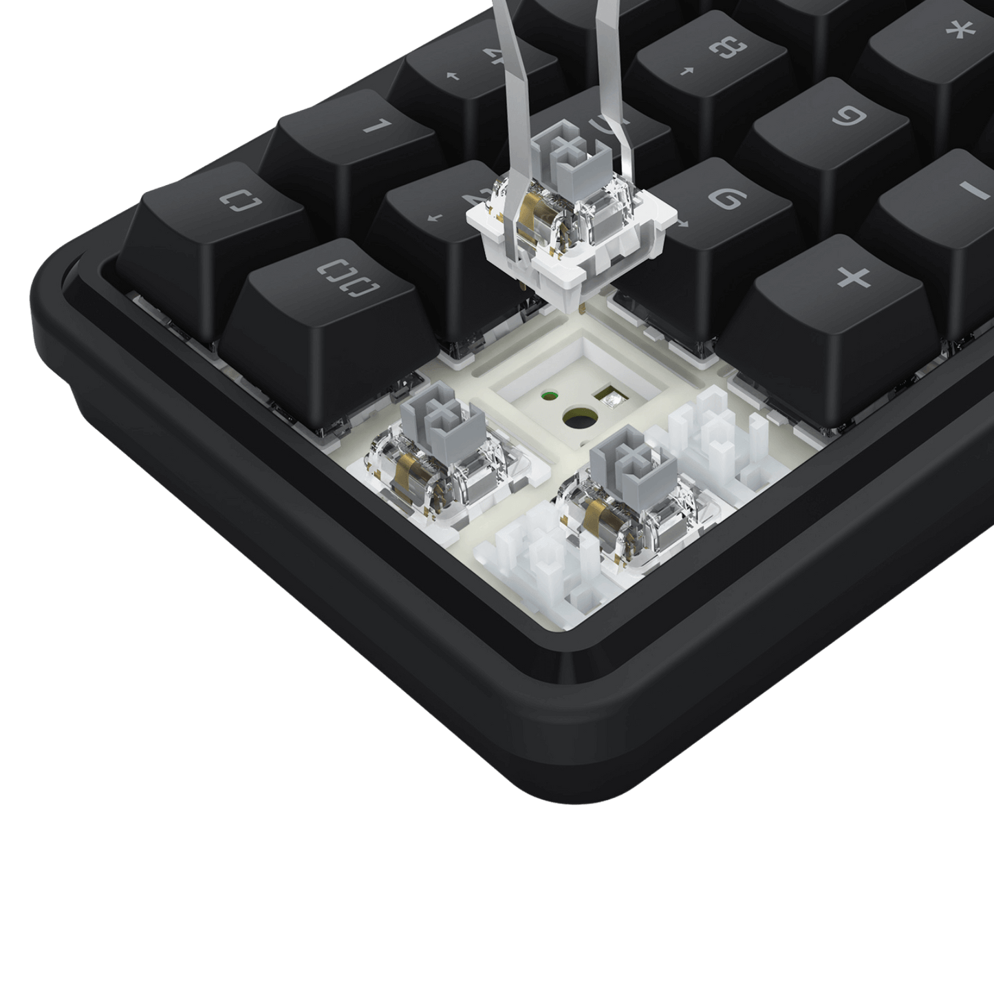 Close-up of a mechanical keyboard with exposed circuitry on a black background