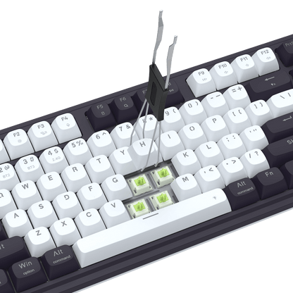 Close-up of a mechanical keyboard with white keys on a black background