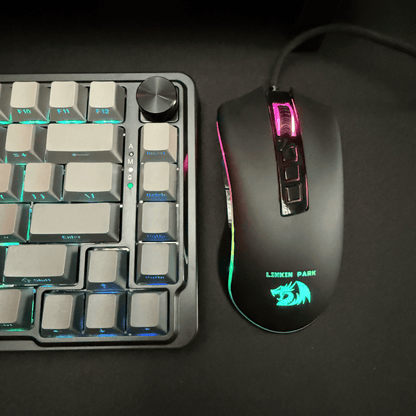 Gaming keyboard and mouse with RGB lighting on a dark surface