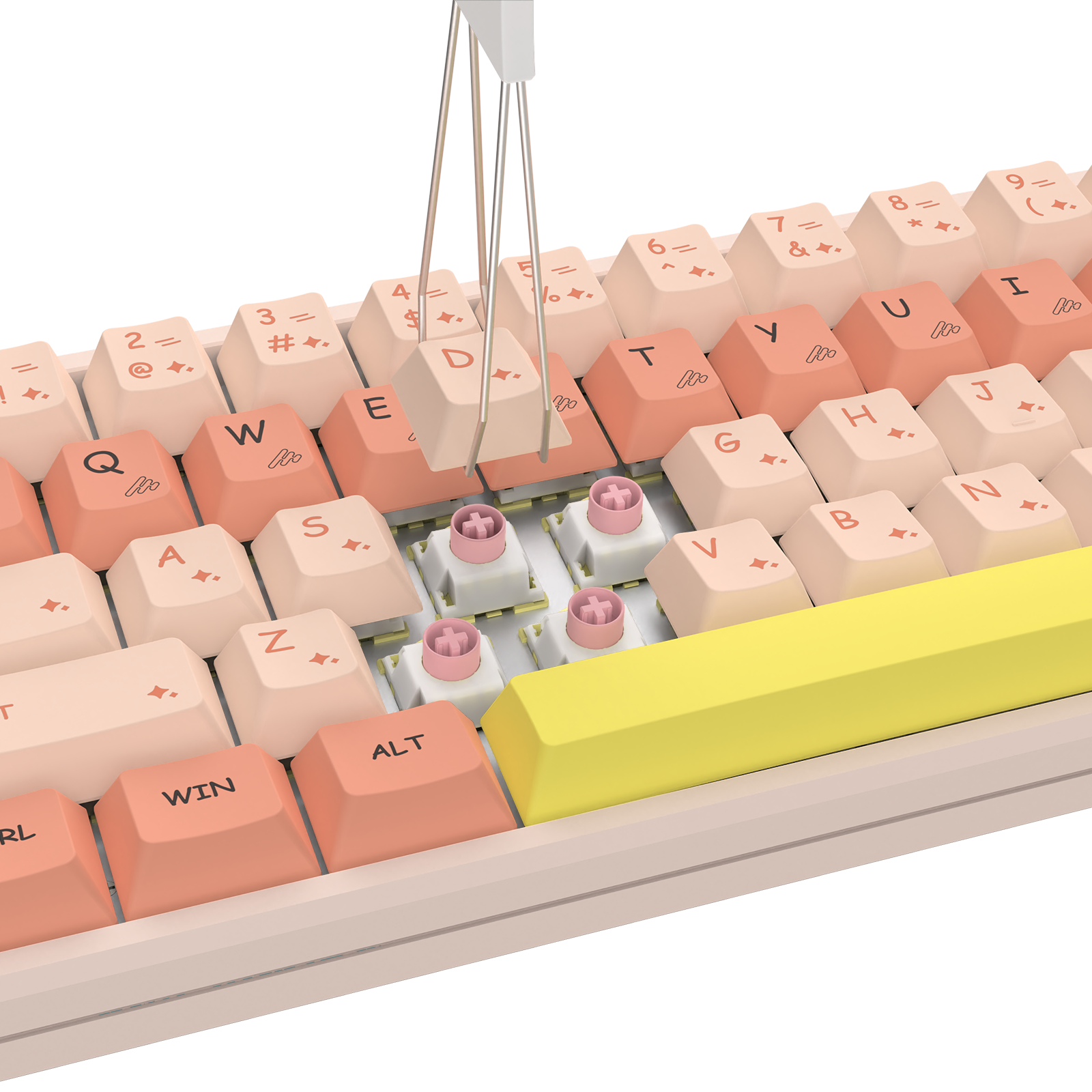 A close-up of a mechanical keyboard with pastel peach, cream, and coral keycaps, a large bright yellow spacebar, and visible pink switch capsules in the switch area. A metal key-stripping tool is positioned above the keyboard against a clean white background.