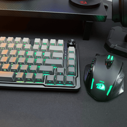 Gaming keyboard and mouse set with RGB lighting on a dark surface