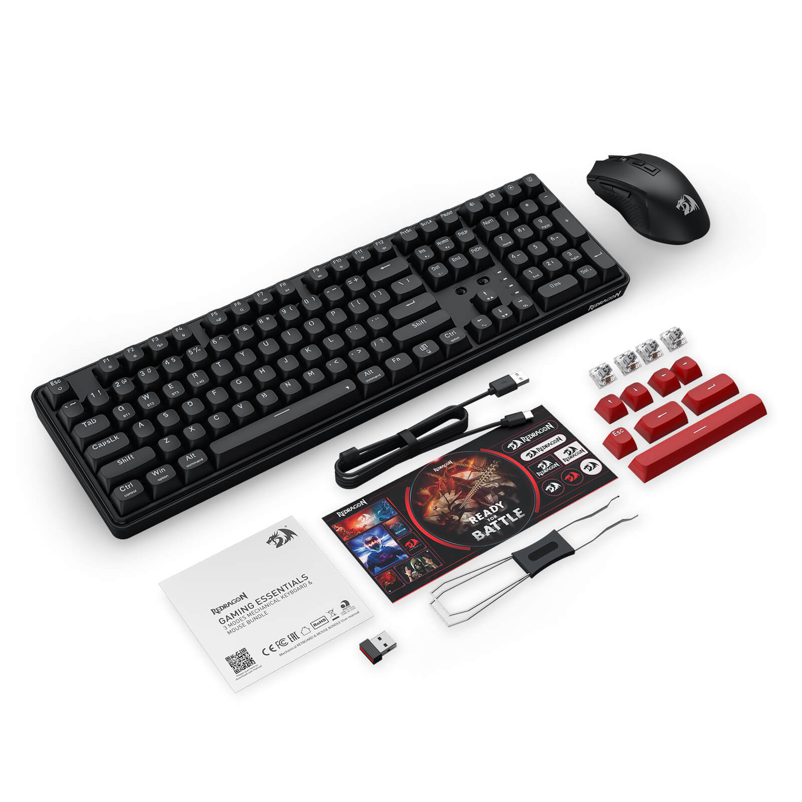 The complete Redragon gaming bundle is laid out, including the keyboard, mouse, USB-C cable, 2.4G receiver, keycap puller, red replacement keycaps, mechanical switches, and user manual.