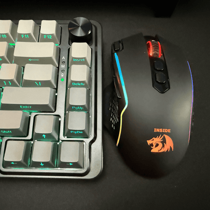 Redragon Gaming keyboard and mouse on a dark surface