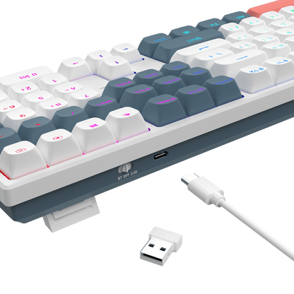 A close-up of a mechanical keyboard showing its side profile, white and gray keycaps, RGB backlighting, a USB-C port, a white USB cable, and a small white USB receiver on a black background.