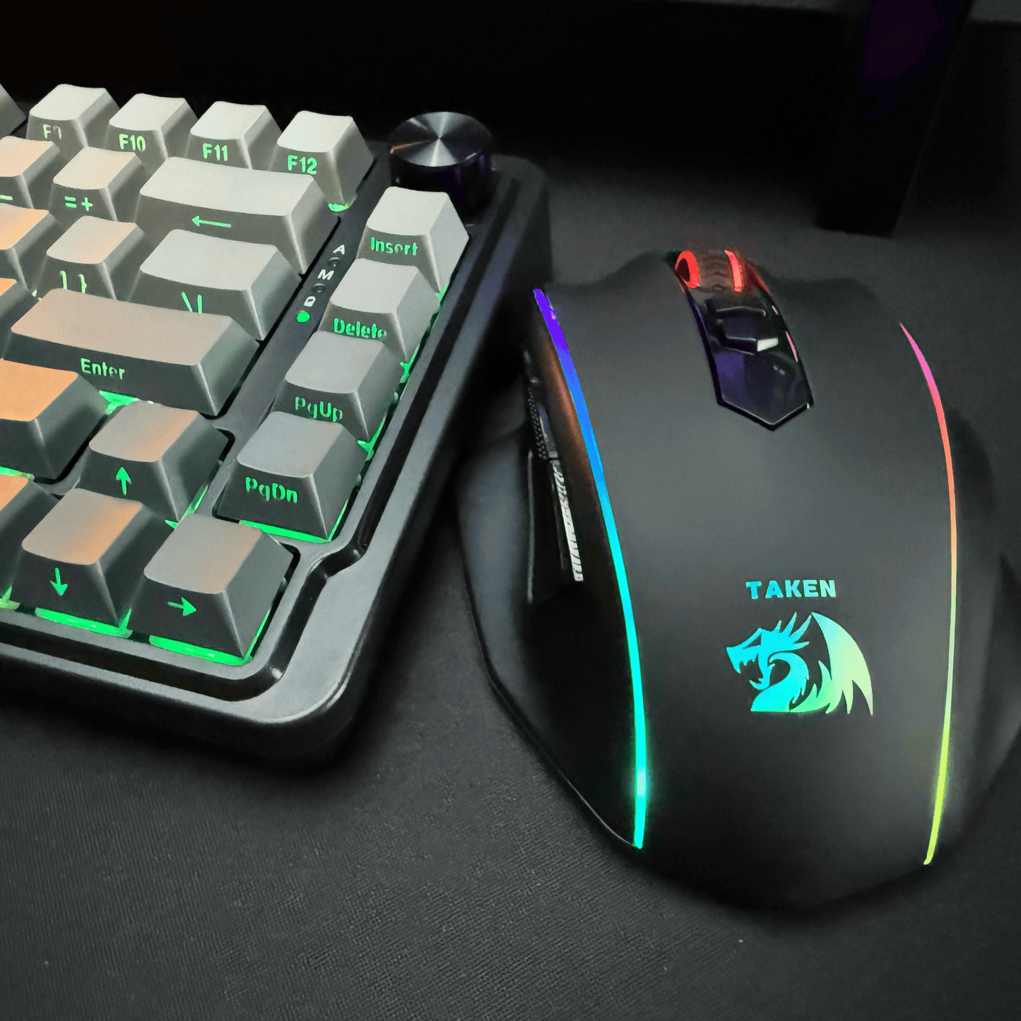 Redragon Gaming keyboard and mouse with RGB lighting on a dark surface