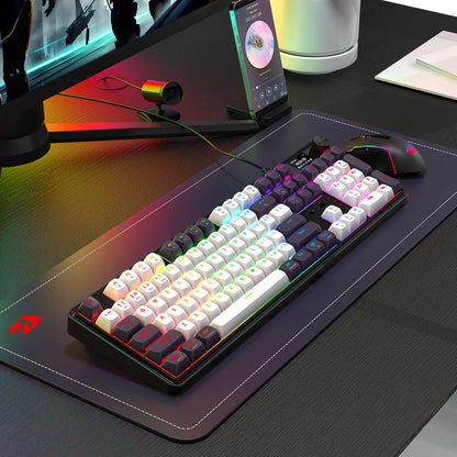 Gaming keyboard and mouse setup on a desk with RGB lighting