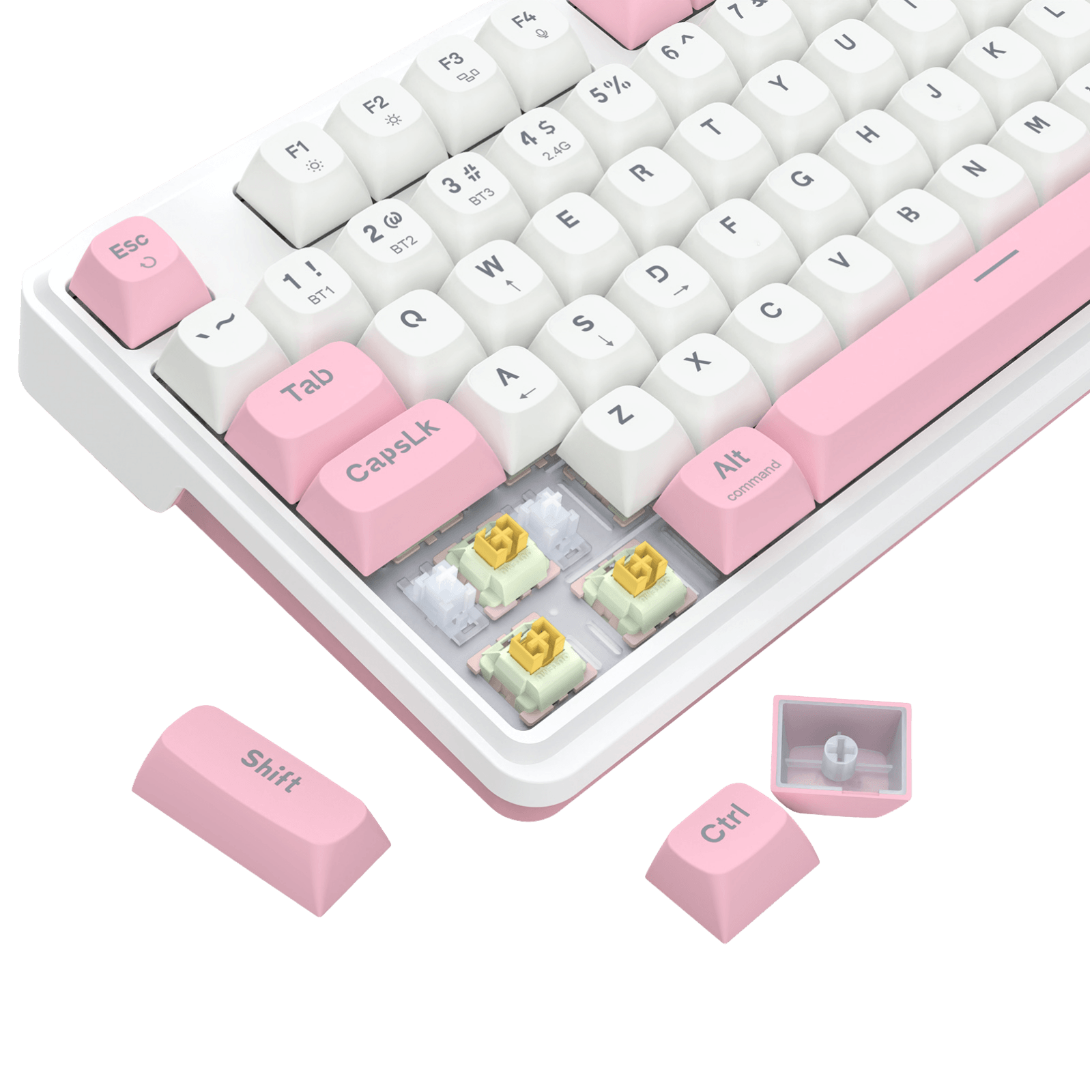 A close-up of a mechanical keyboard with white keycaps, pastel pink accent keys, and exposed switch capsules showing gold and mint contacts. Several loose pink keycaps are arranged around the keyboard on a clean white background.