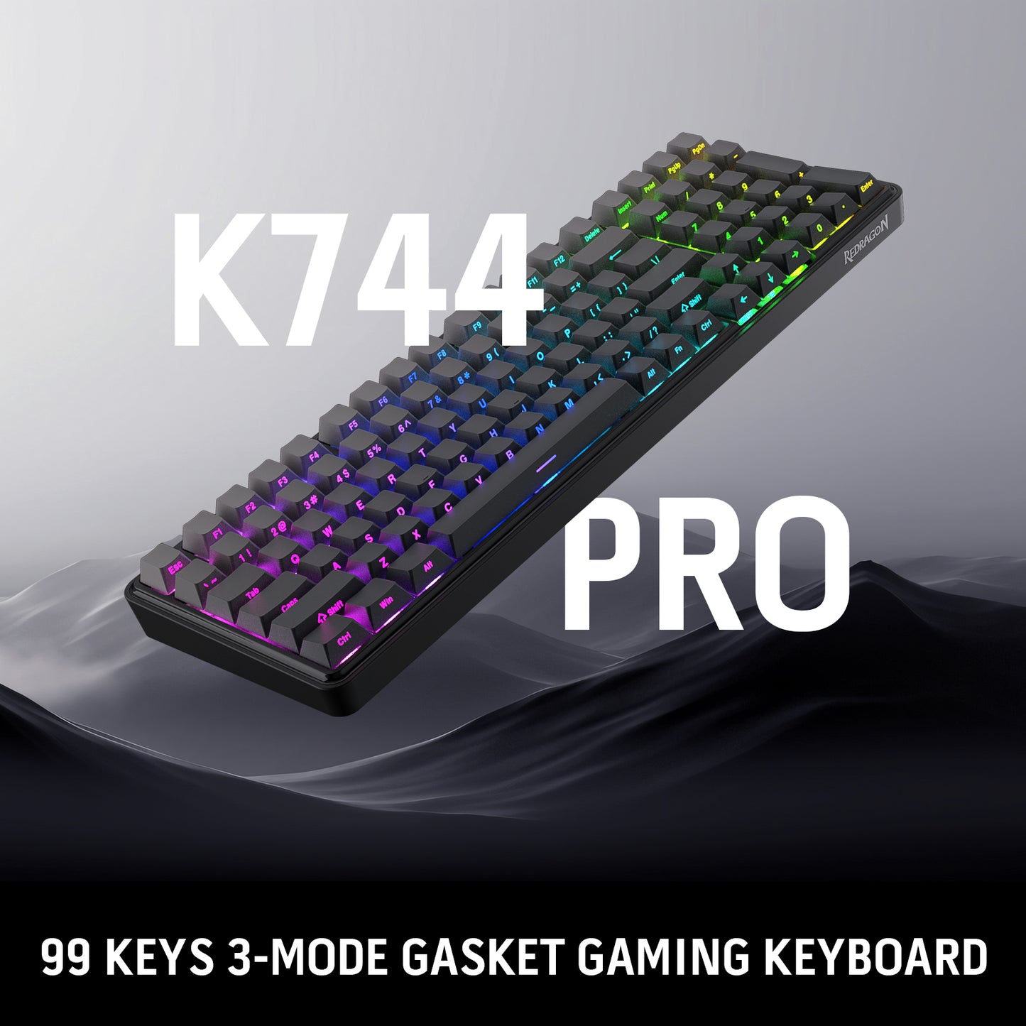 The K744 PRO 99-key 3-mode gasket gaming keyboard is displayed against a sleek, dark backdrop, showcasing its vibrant RGB backlighting and compact design.