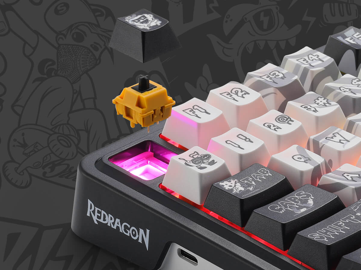 Close-up of a mechanical keyboard with keycaps and a switch, featuring the Redragon brand.