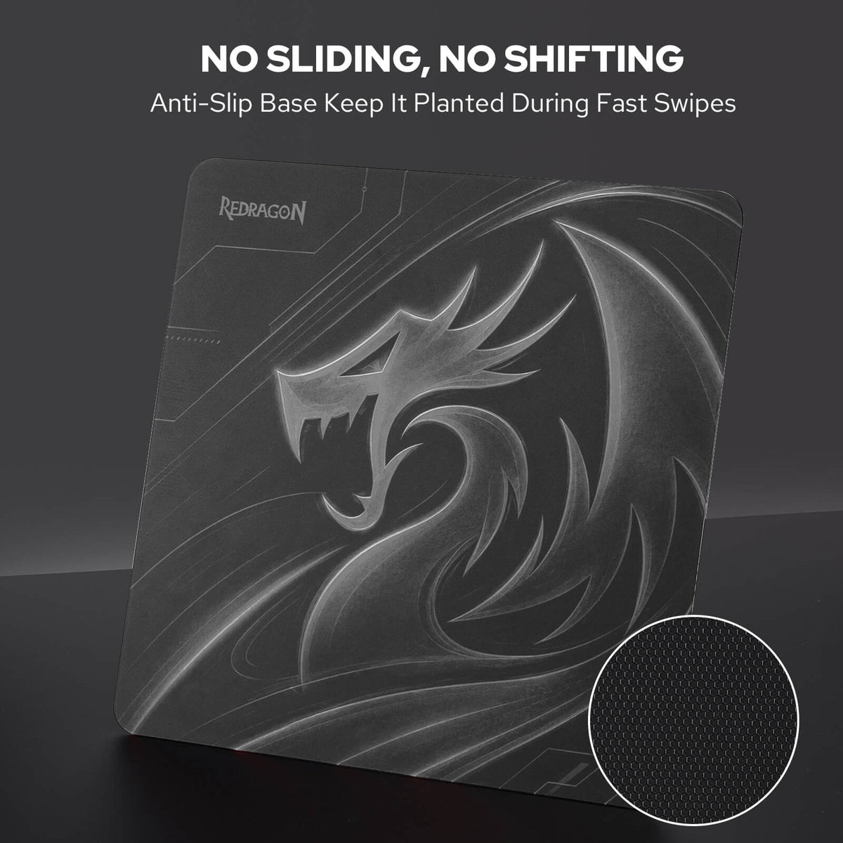 Redragon PG1M Glass Mouse Pad - 'NO SLIDING, NO SHIFTING' with a circular inset showing the textured anti-slip surface.