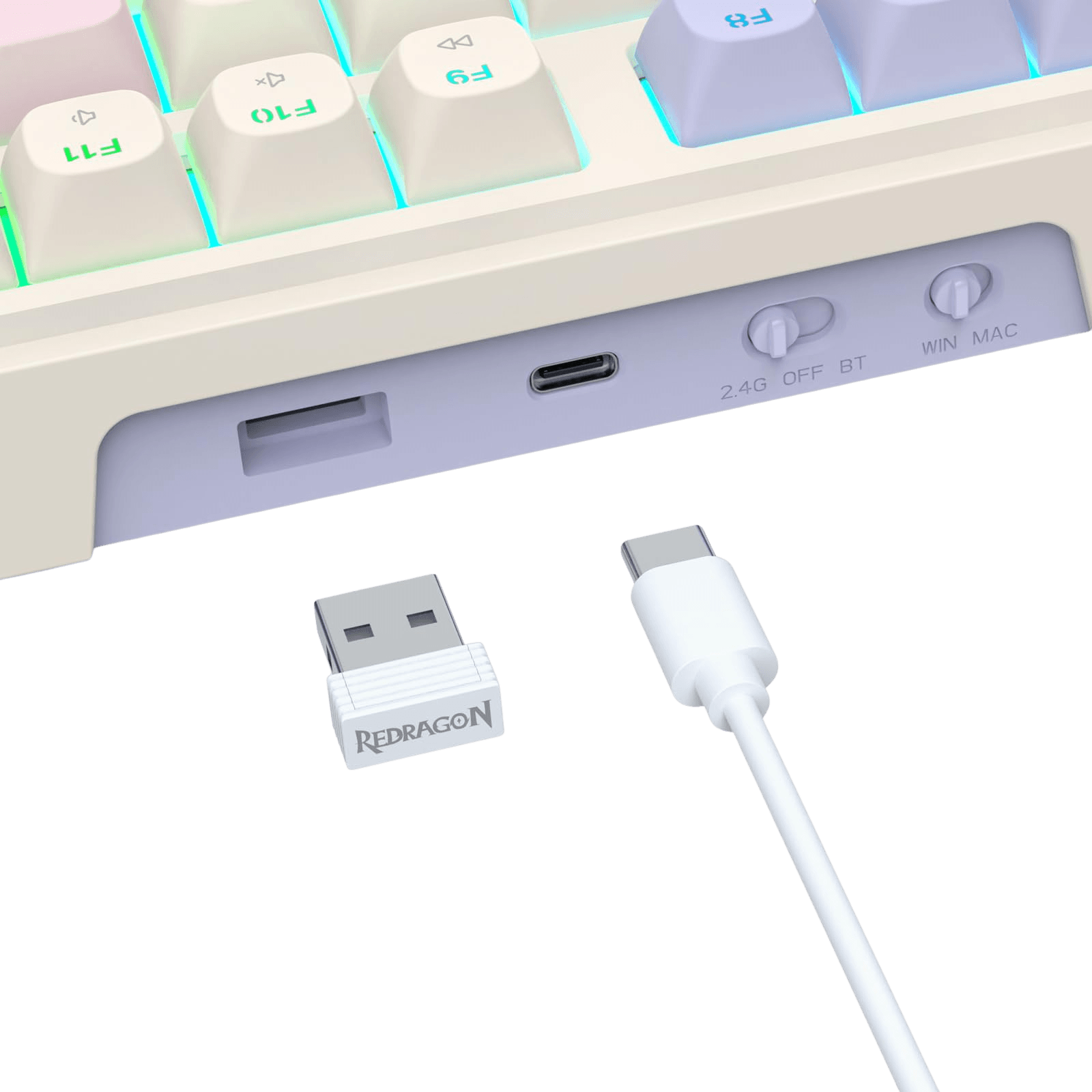 A close-up of a white Redragon USB receiver and matching white USB-C cable shown against a black background, with part of a pastel mechanical keyboard visible at the top.