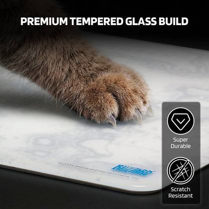 The pad’s "PREMIUM TEMPERED GLASS BUILD" is super durable and scratch-resistant, even against a cat’s claws.
